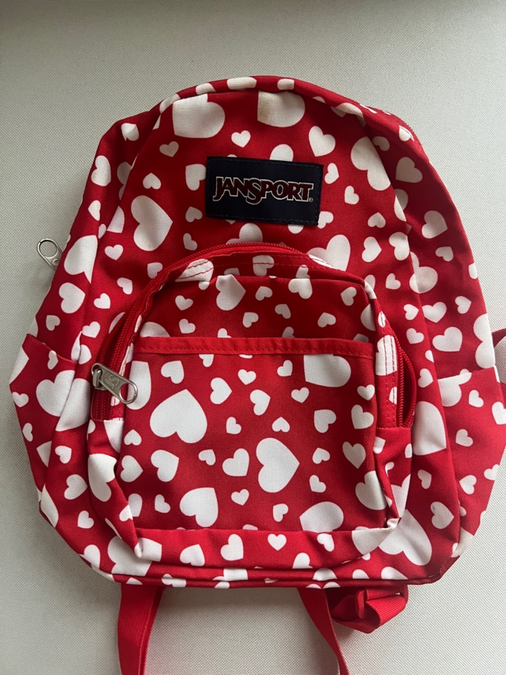 Jansport Red Mini Backpack with White Heart Print